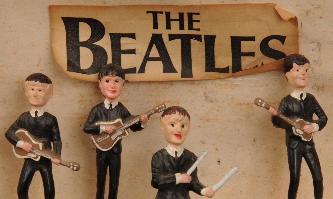 The Beatles: figurines, Invicta Plastics brooch & two scatter pins A set of Beatles figurines marked