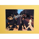The Beatles: An autographed publicity photograph, the colour photograph taken in Abbey Road signed
