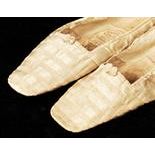 Queen Victoria previously personally owned and worn pair of ivory silk slippers inscribed 'Worn by