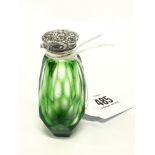 A green Cameo glass scent bottle with silver lid.