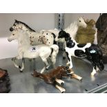 Five various Beswick china horses (examine).