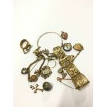 A bag of antique mixed gilt metal costume jewellery.