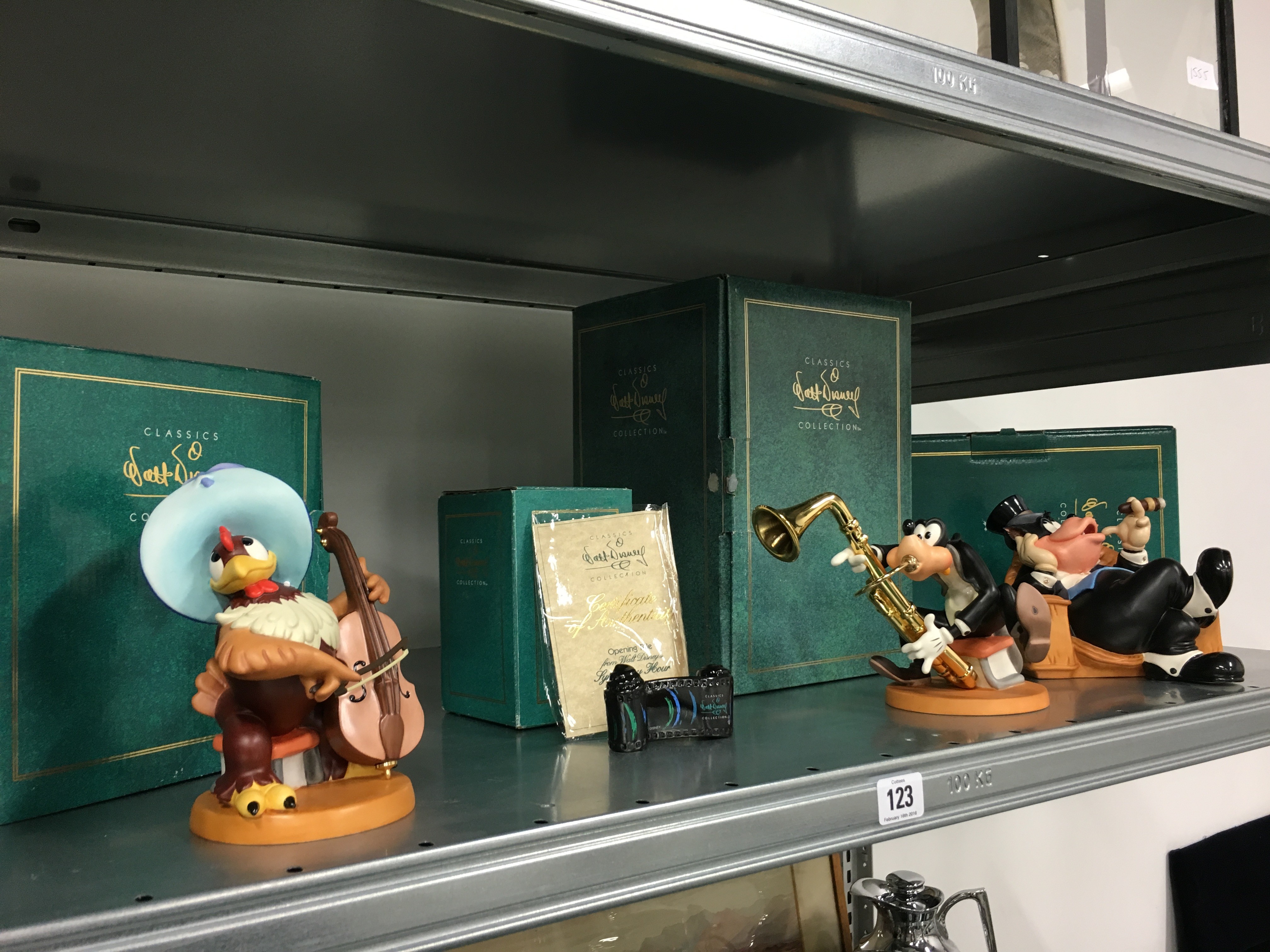 Four various Walt Disney Classics Collection figures: Symphony Hour, Sylvester macaroni,