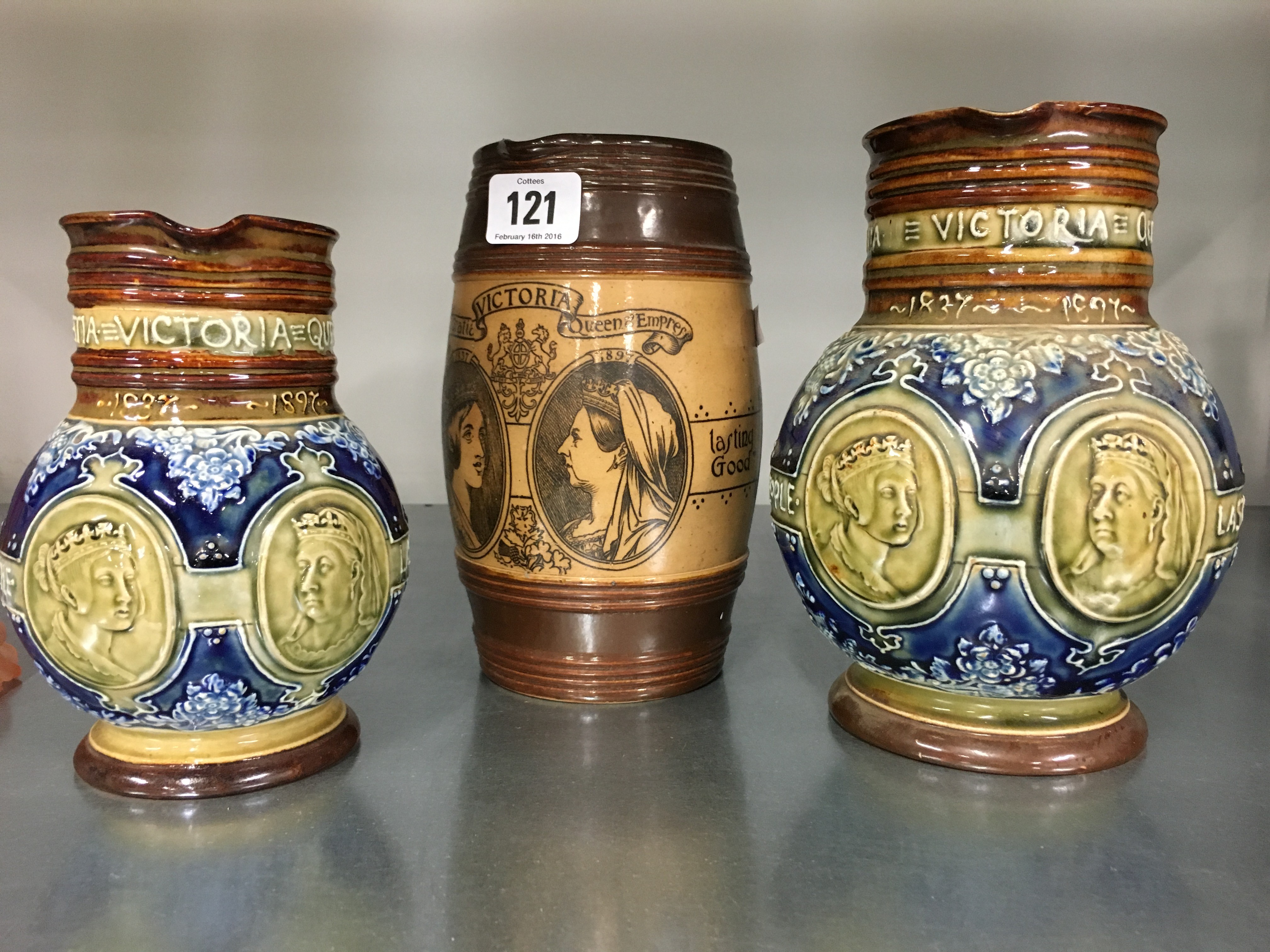 Three various 19th century Queen Victoria 1897 Jubilee Commemorative stoneware jugs.