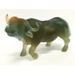 A Daum French glass Pate de Verre model of a water buffalo.