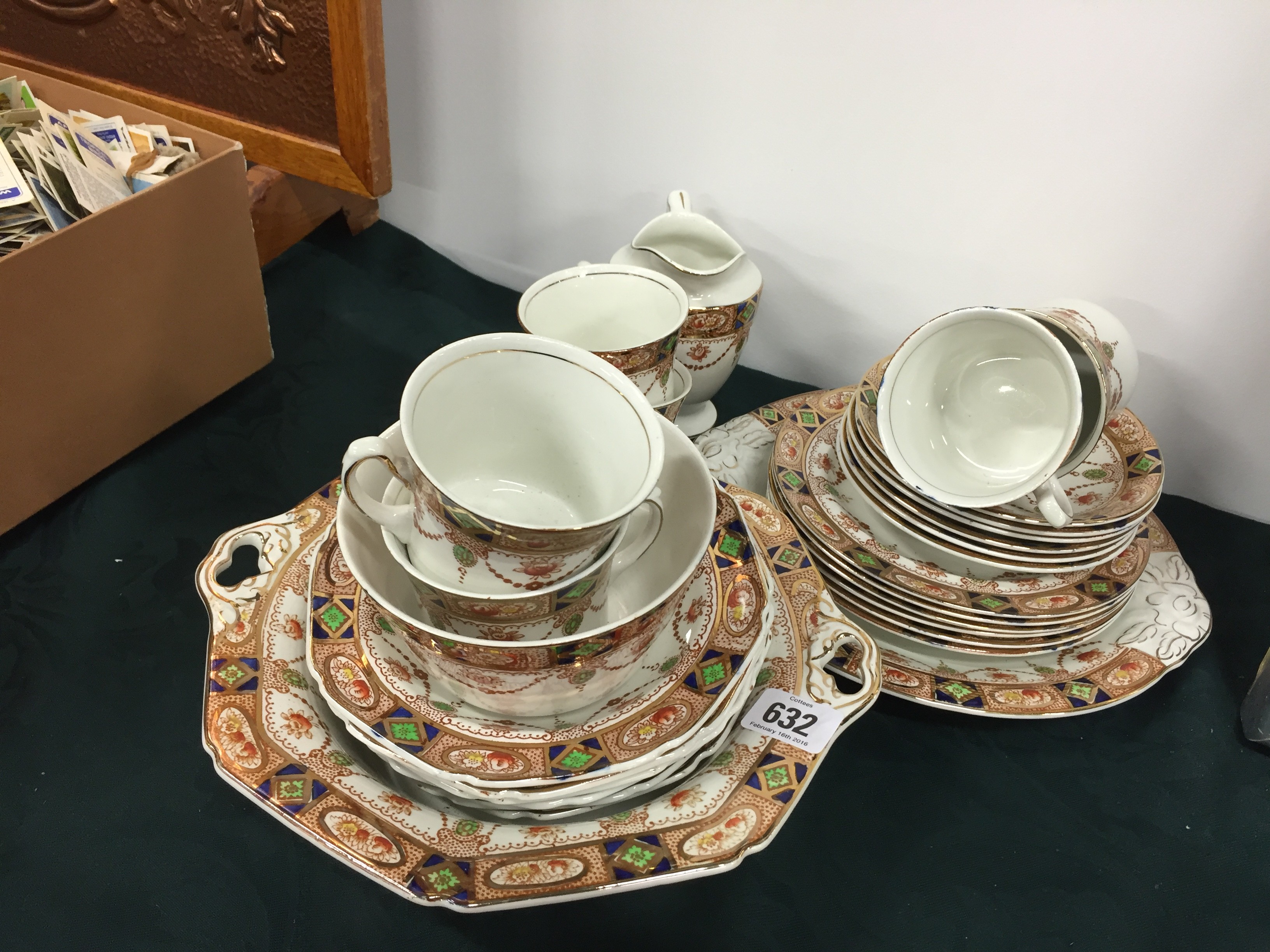 The residue of an early 20th century china teaset decorated in an Imari pattern.