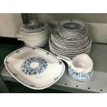 The residue of a Noritake china dinner service, decorated in the Blue Moon pattern.