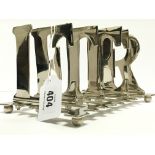 A LETTER silver plated letter rack.