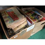 Two boxes containing a quantity of mid 1970's British comics and magazines including The Beezer and