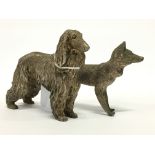 A small metal model of an Afghan Hound together with a Fox.