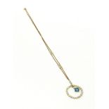 A seed pearl and blue stone 9 carat gold necklace.