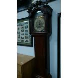 An 18th century flame mahogany cased longcase clock with brass dial and movement and painted moon