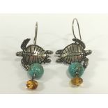 A pair of silver turquoise and citrine earrings in the form of Turtles.