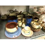 A collection of various West Country Pottery Motto Ware items.