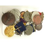 A carton containing various Attendance and other medals.