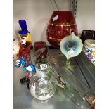 A collection of various glass items including a Vaseline glass vase and Mary Gregory glass jug.