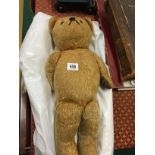 A mid 20th century jointed Teddy Bear.