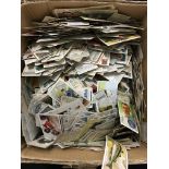 A box containing a large quantity of various unsorted cigarette cards (poor to fair).