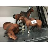 Four various matt brown glazed Beswick china horses (one af).