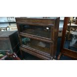 An oak Globe Wernicke style three tier glazed bookcase.