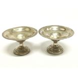 A pair of miniature silver comports.