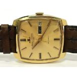 A Jaeger Le Couture gentleman's club square faced automatic wrist watch with Champagne face,