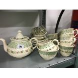 The residue of a Masons Ironstone china tea set, decorated in the Madrigal pattern.