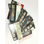 A collection of various mint presentation stamp sets (high value).