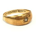 An 18 carat gold diamond set Gypsy ring.(3.