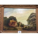 A 19th century gilt framed oil on canvas; Country Cottage.