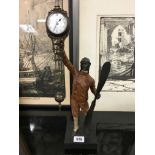 A cold painted bronze mystery clock modelled as a bronze airman.