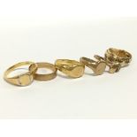 Seven gold and yellow metal rings (20 grams).