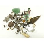 A small bag of various jewellery items including some gold, silver etc.