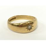 An 18 carat gold diamond set Gypsy ring.(4.