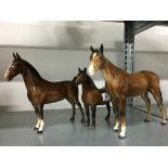 A Beswick china model of a Dartmoor Pony together with a Beswick china brown glazed horse and