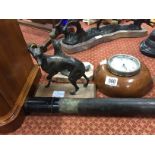 An oak cased Smiths motoring clock together with two metal ornaments and a telescope.