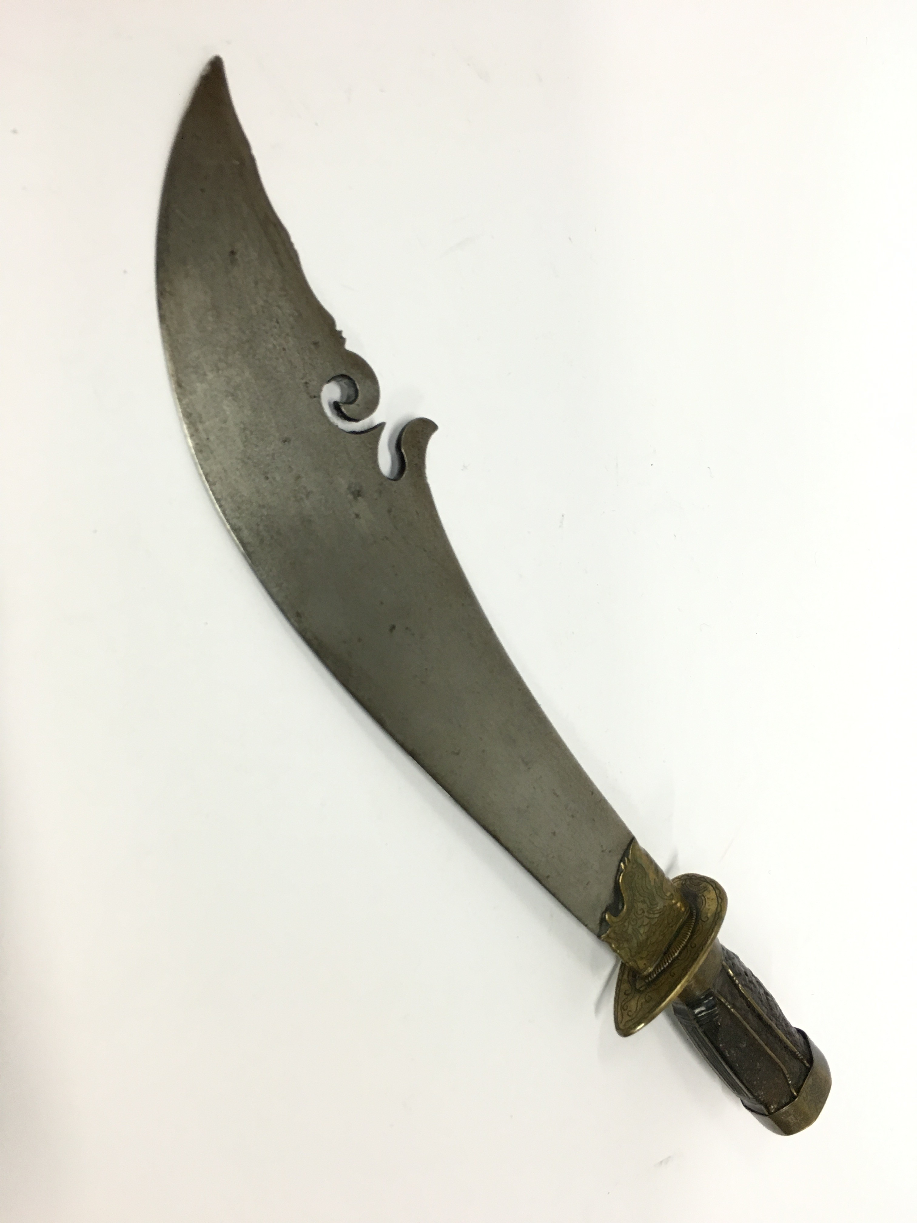 A North African (probably Egyptian) ceremonial knife with curved and cut steel blade and engraved