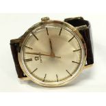 An Omega 9 carat gold cased gents wrist watch inscription to reverse,