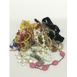 A bag of costume jewellery.