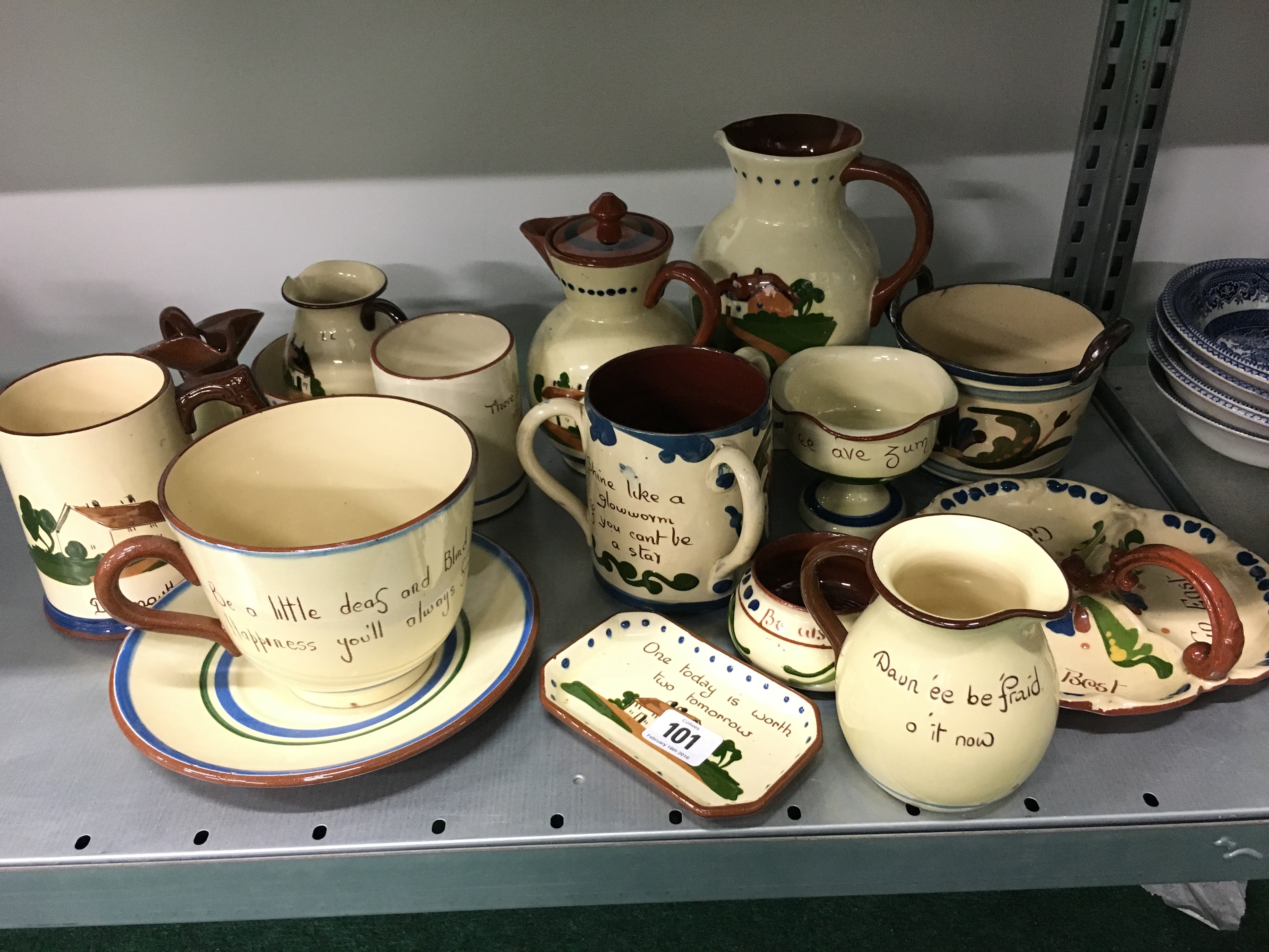 A collection of various West Country Pottery Motto Ware items.