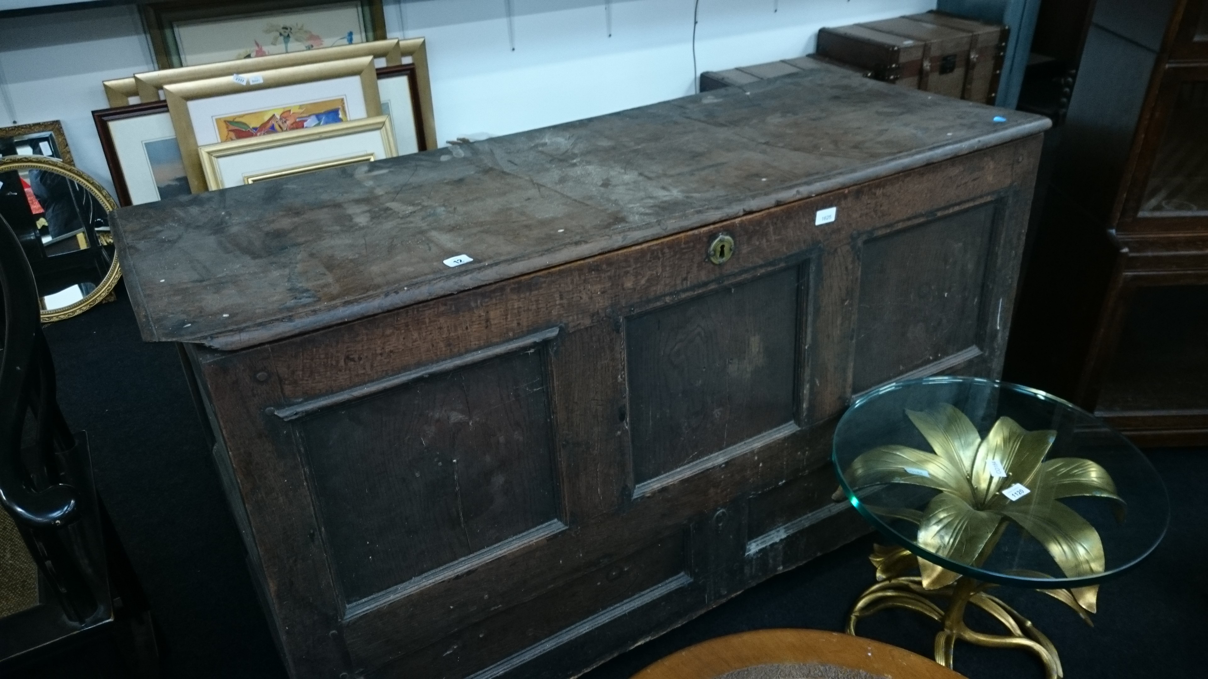 A large early oak panelled mule chest.