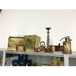 A collection of various copper and brass items.