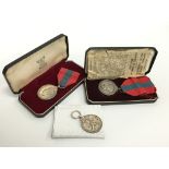 An Imperial Service medal awarded to Miss Lillian Casey in original fitted case together with two