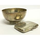 A silver sugar bowl together with a small silver cigarette case (237 grams overall).