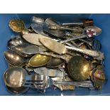 A carton of collectables including teaspoons.