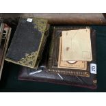 A collection of various 19th century photograph albums and contents.