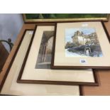 Three framed and glazed watercolours: Continental street scenes and buildings.
