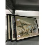 A set of three framed and glazed prints of Chinese topographical scenes.