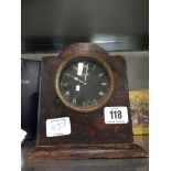 A Jaeger car clock in wooden mount (af).