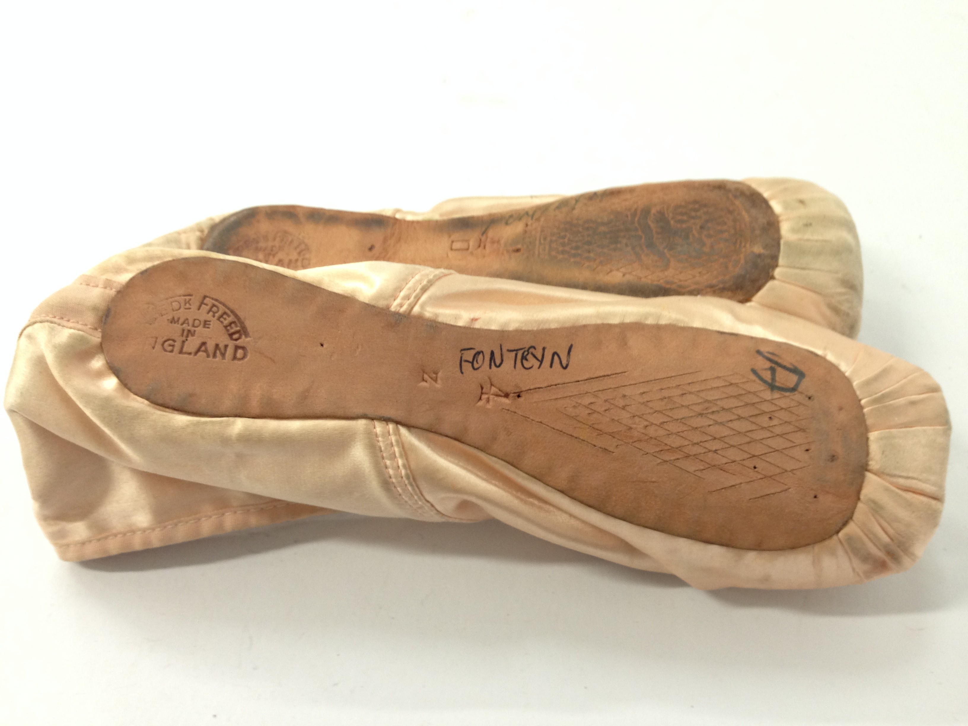 Margot Fonteyn: Signed pair of pink ballet shoes together with a signed ...